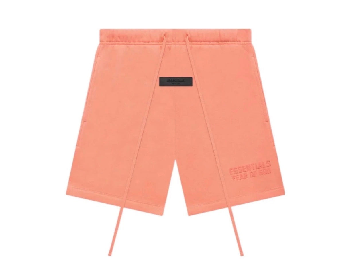 Peach-colored shorts on a white background