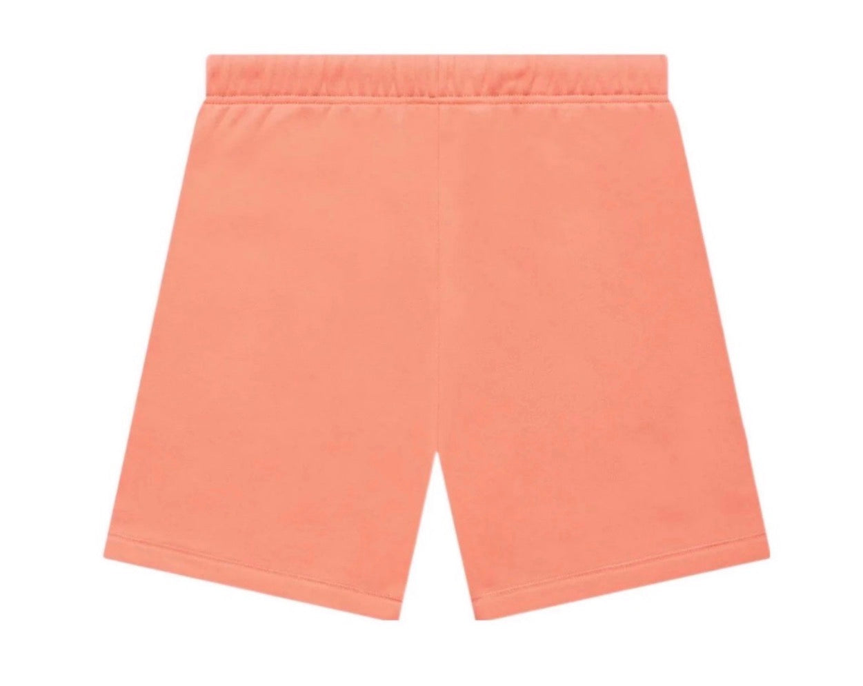 Peach-colored shorts on a white background