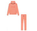 peach colored hoodie and pants