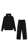 Black hoodie and pants set on a white background