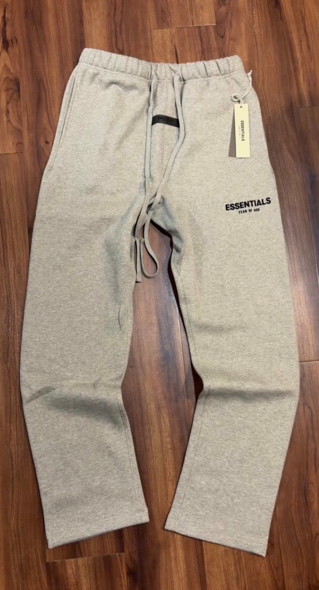 Gray sweatpants relaxed and on a wooden floor 